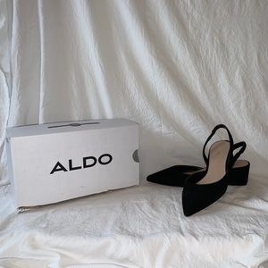 Strap back black heel